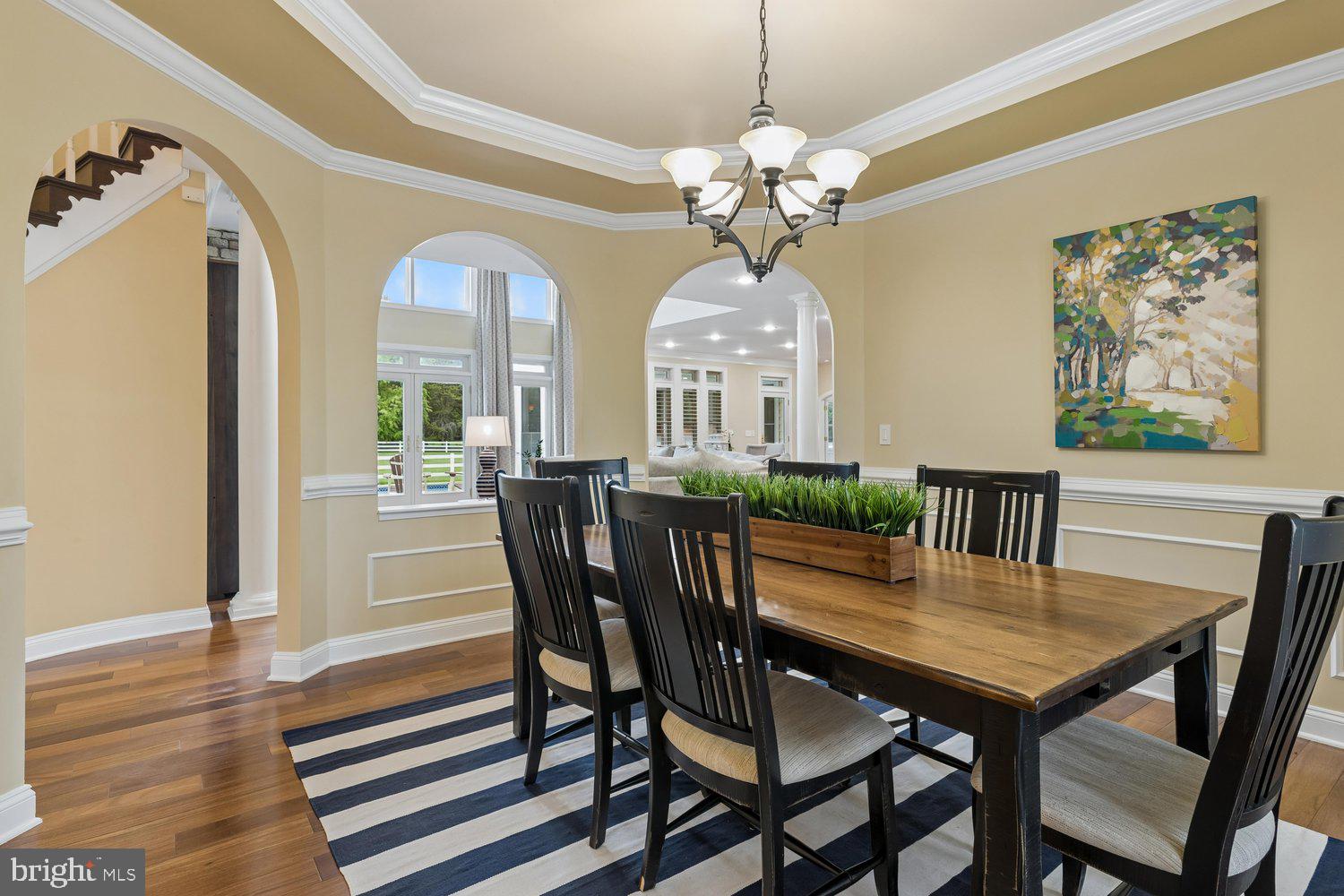313 Wye Road Queenstown, MD 21658 - Photo 53 of 132 Elegant dining space with arched windows.
