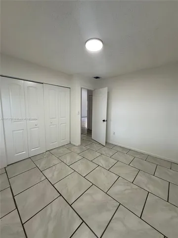 a view of a backyard of the house