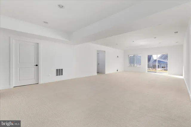 an aerial view of a house with a swimming pool