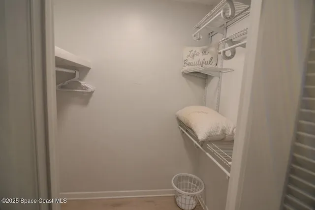 a bathroom with a shower and a toilet