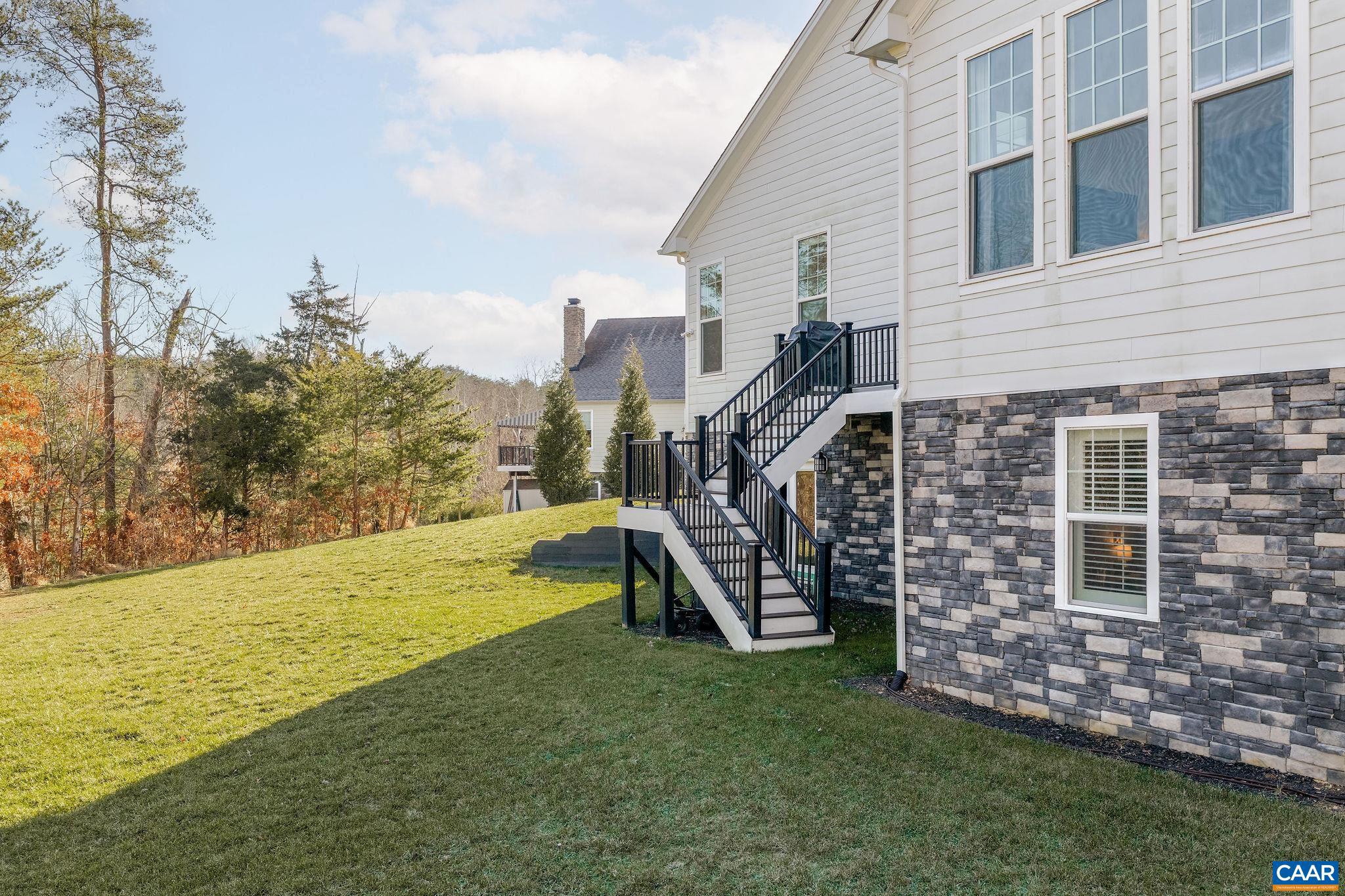 2744 Lockerbie Lane Keswick, VA 22947 - Photo 60 of 75 a view of a house with a yard