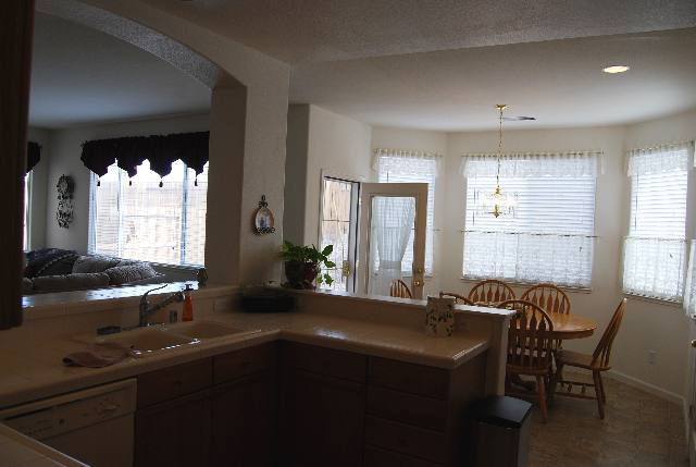 1680 Canyonlands Way Reno, NV 89521 - Photo 5 of 9 a view of a a dining room with furniture and window