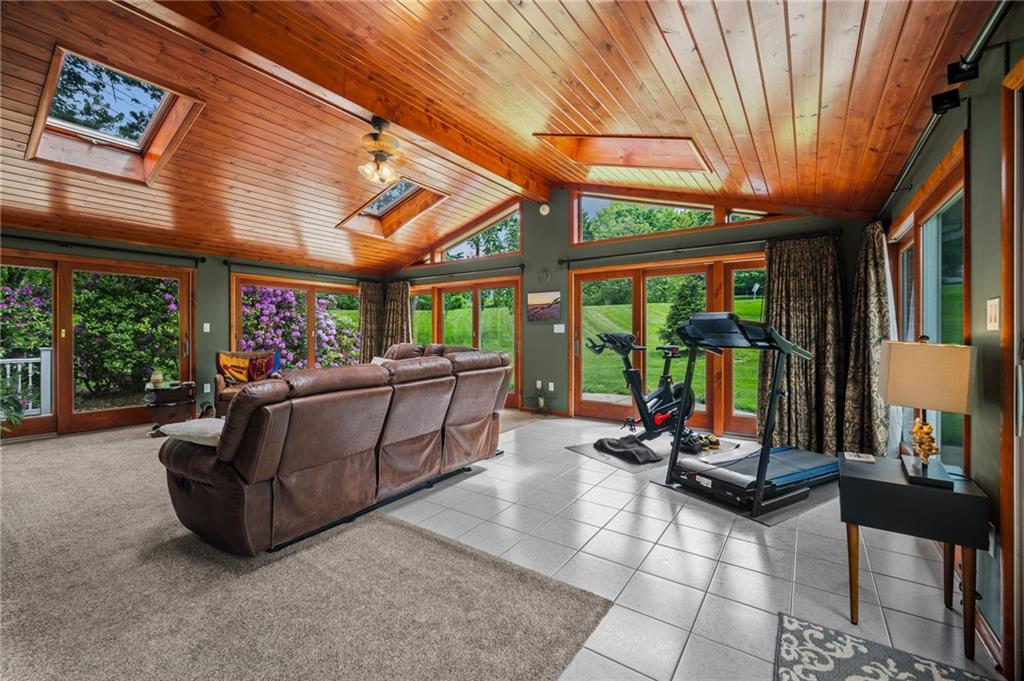 2387 Harrison City Road Export, PA 15632 - Photo 18 of 48 a living room with couch a table and chairs