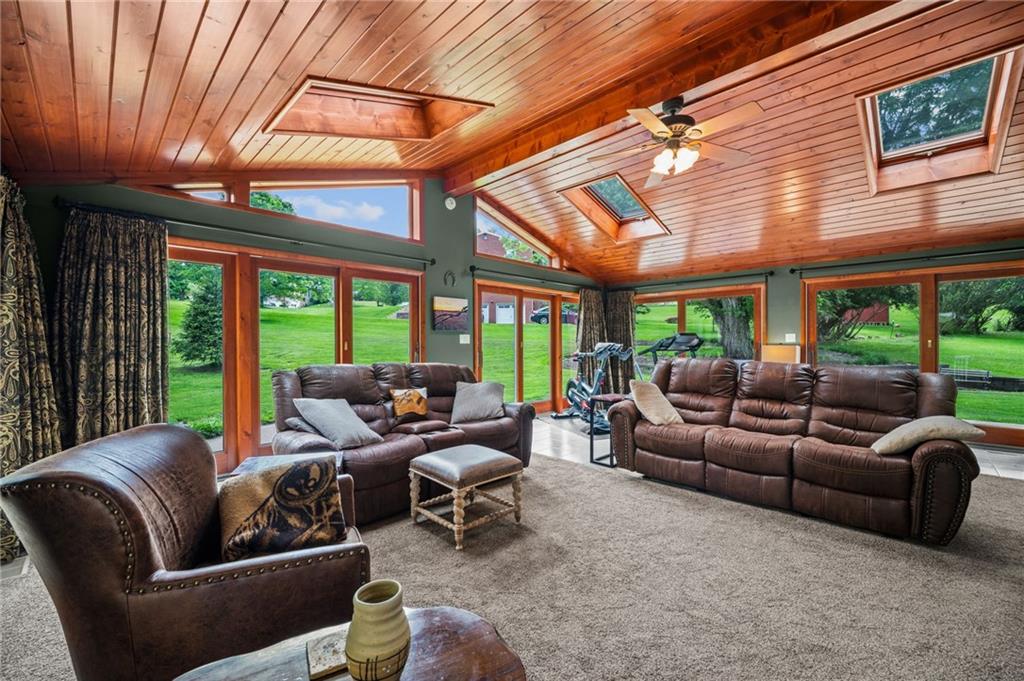 2387 Harrison City Road Export, PA 15632 - Photo 21 of 48 a living room with furniture and a large window