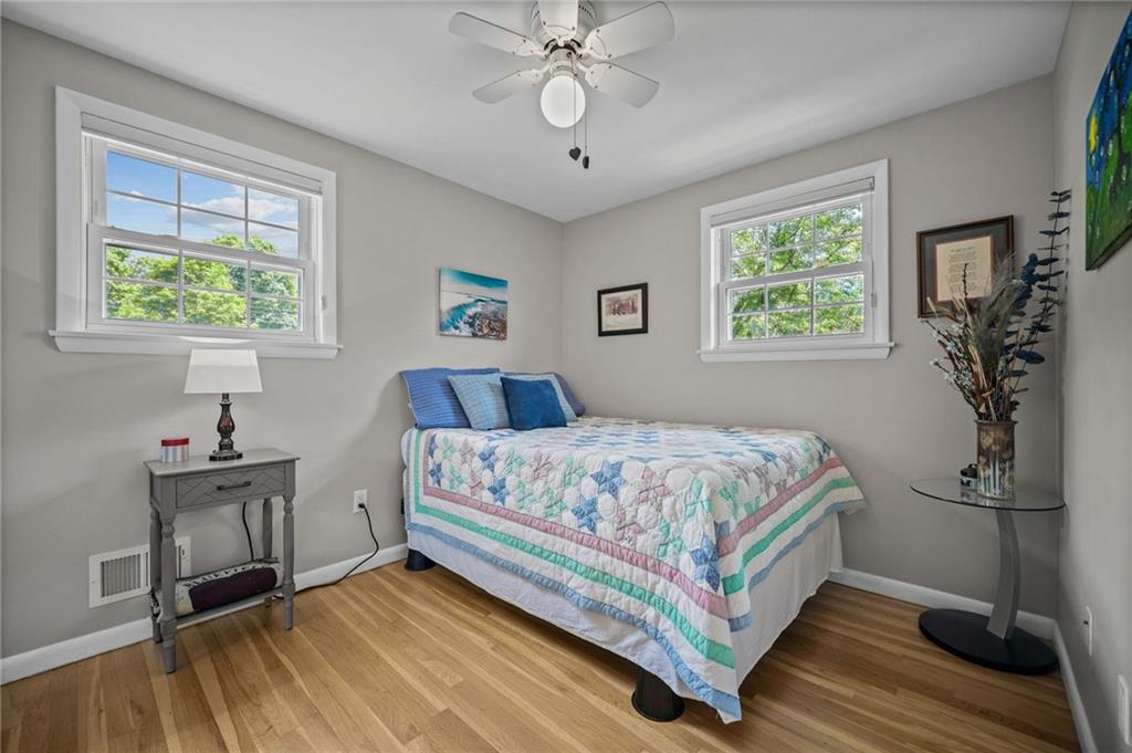 2387 Harrison City Road Export, PA 15632 - Photo 25 of 48 a bedroom with a bed table and a window