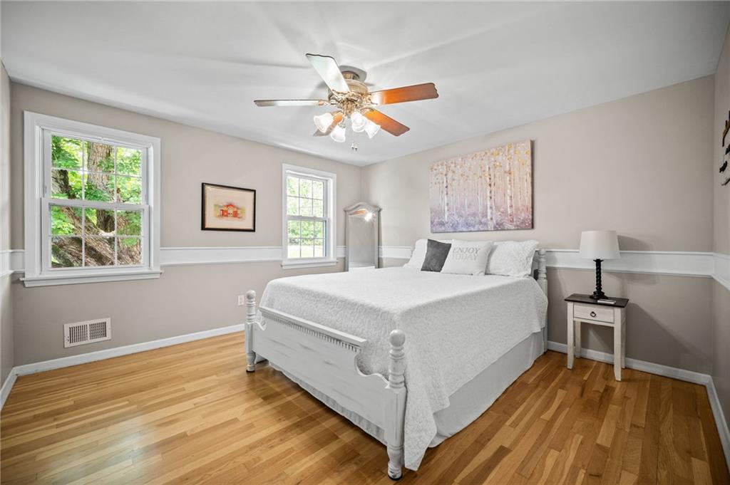 2387 Harrison City Road Export, PA 15632 - Photo 27 of 48 a bedroom with a bed and a window