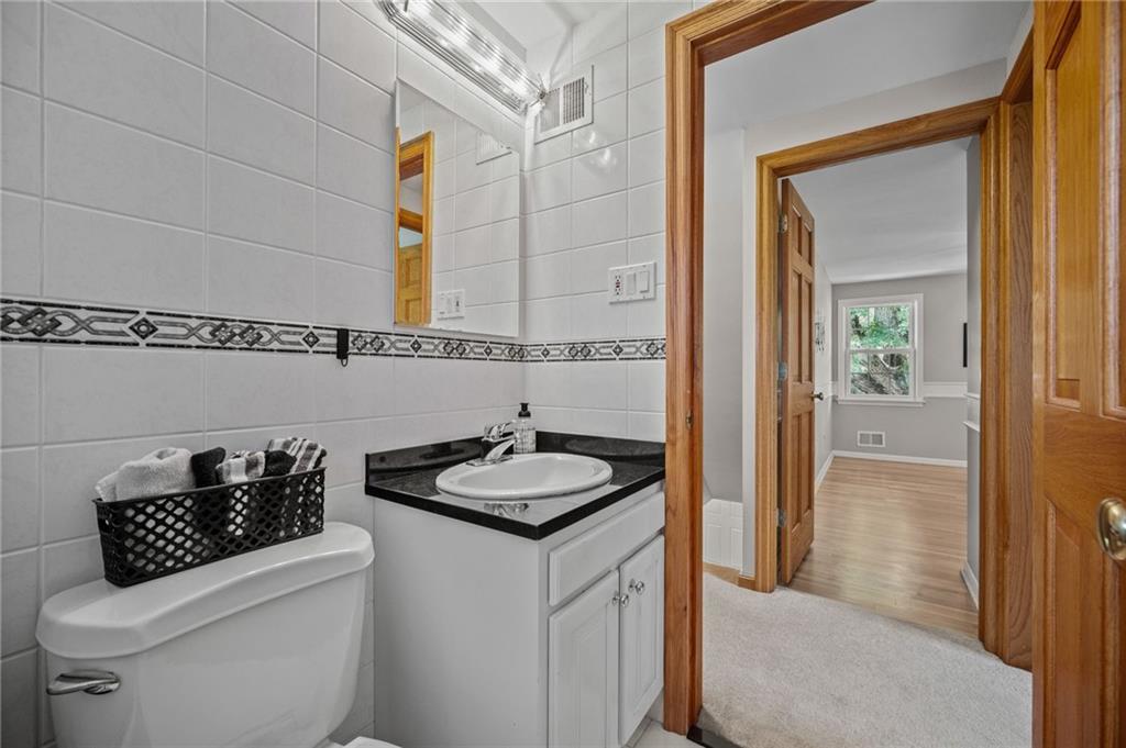 2387 Harrison City Road Export, PA 15632 - Photo 30 of 48 a bathroom with a sink and a mirror