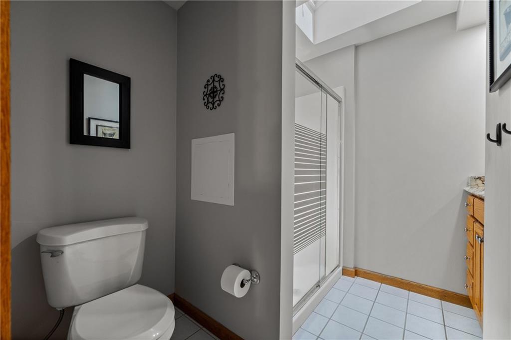 2387 Harrison City Road Export, PA 15632 - Photo 34 of 48 a bathroom with a toilet and a shower