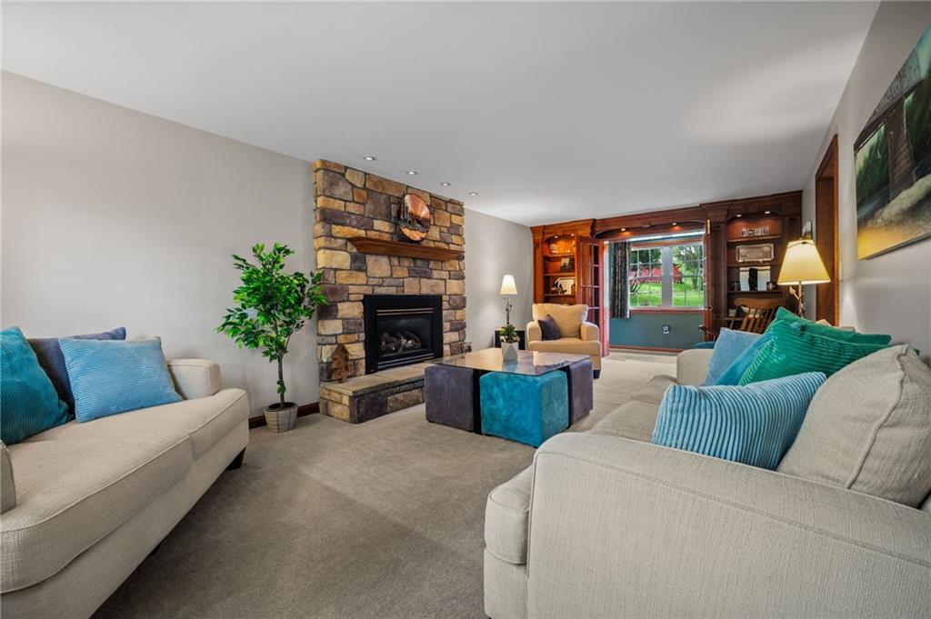2387 Harrison City Road Export, PA 15632 - Photo 6 of 48 a living room with furniture fireplace and a large window