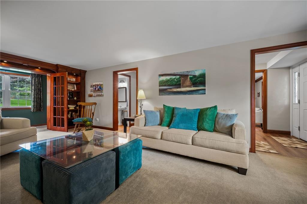 2387 Harrison City Road Export, PA 15632 - Photo 8 of 48 a living room with furniture and a flat screen tv