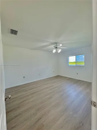 a view of a room with an empty space