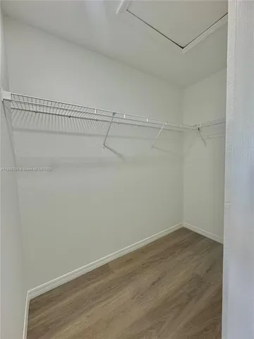 a view of a room with racks on the wall