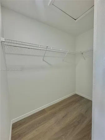 a view of a room with racks on the wall