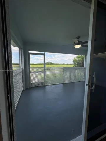 a view of water heater room with window