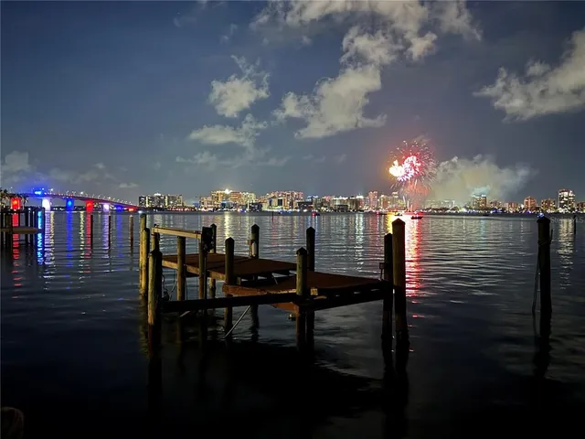 a view of a chairs and table in patio