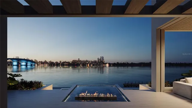a view of a dining room with furniture and window
