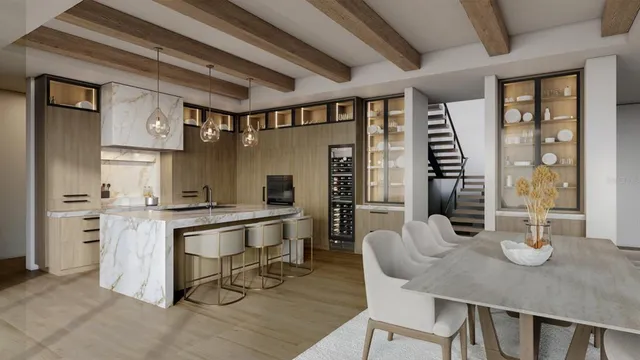 a aerial view of a house with table and chairs