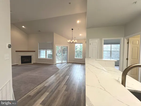 a view of a livingroom with a fireplace