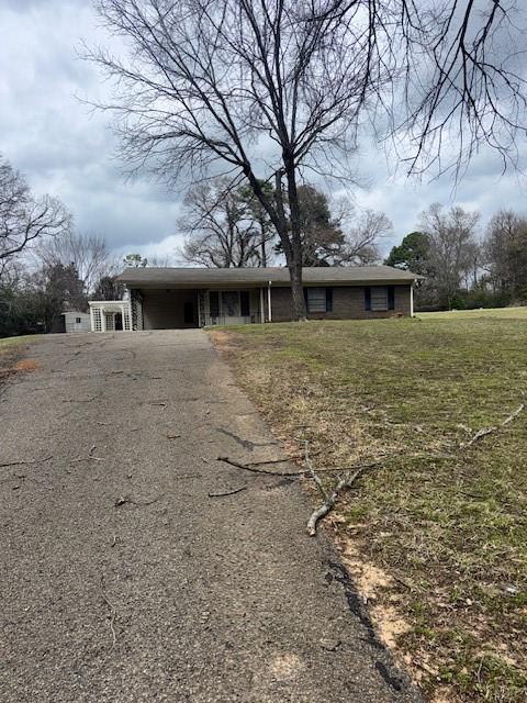 812 Lakeside Drive Athens, TX 75751 - Photo 2 of 13 a front view of house with yard