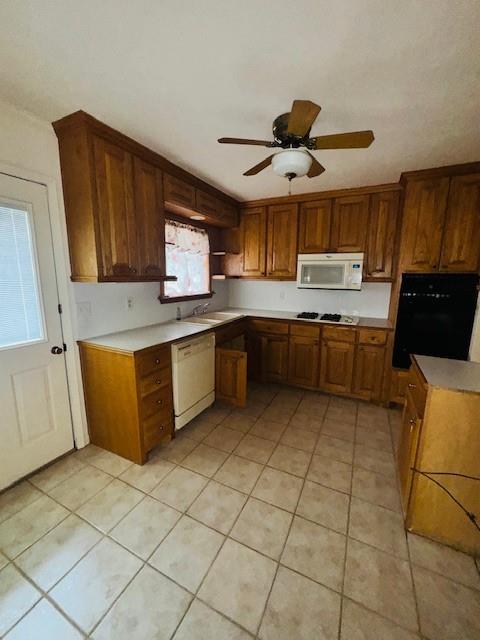 812 Lakeside Drive Athens, TX 75751 - Photo 7 of 13 a kitchen with stainless steel appliances granite countertop a sink and a stove