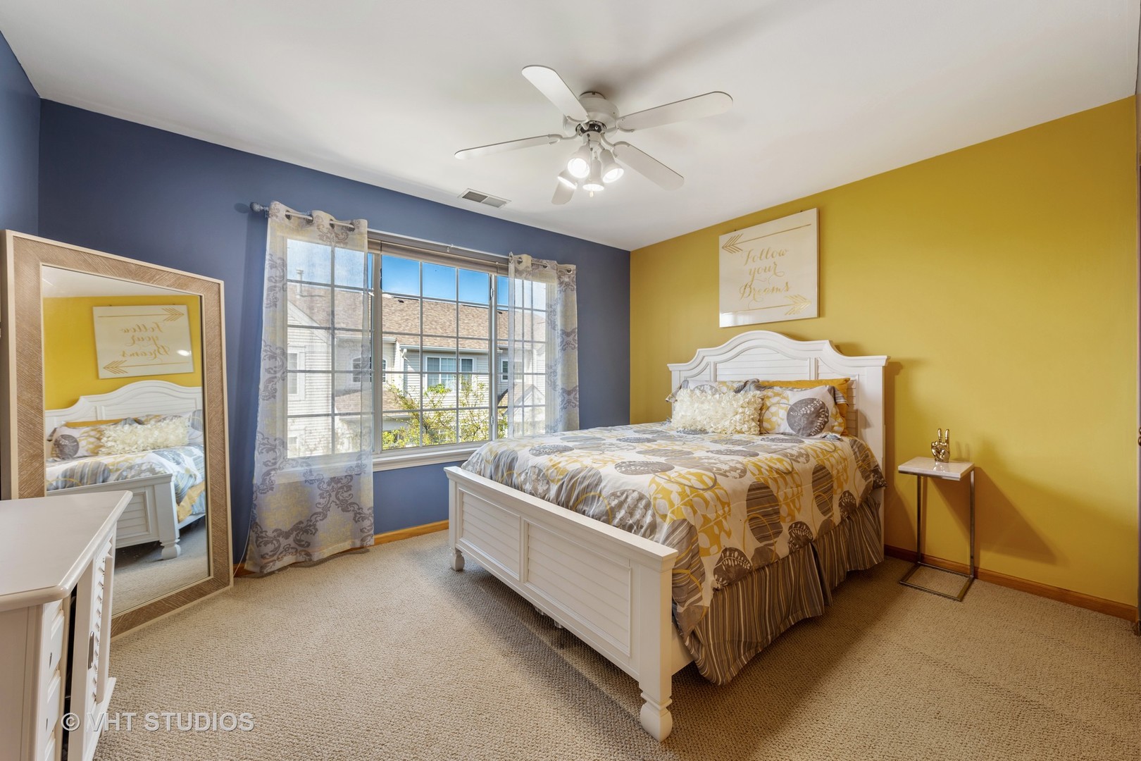 3423 Ravinia Circle Aurora, IL 60504 - Photo 15 of 17 a spacious bedroom with a bed and a chandelier