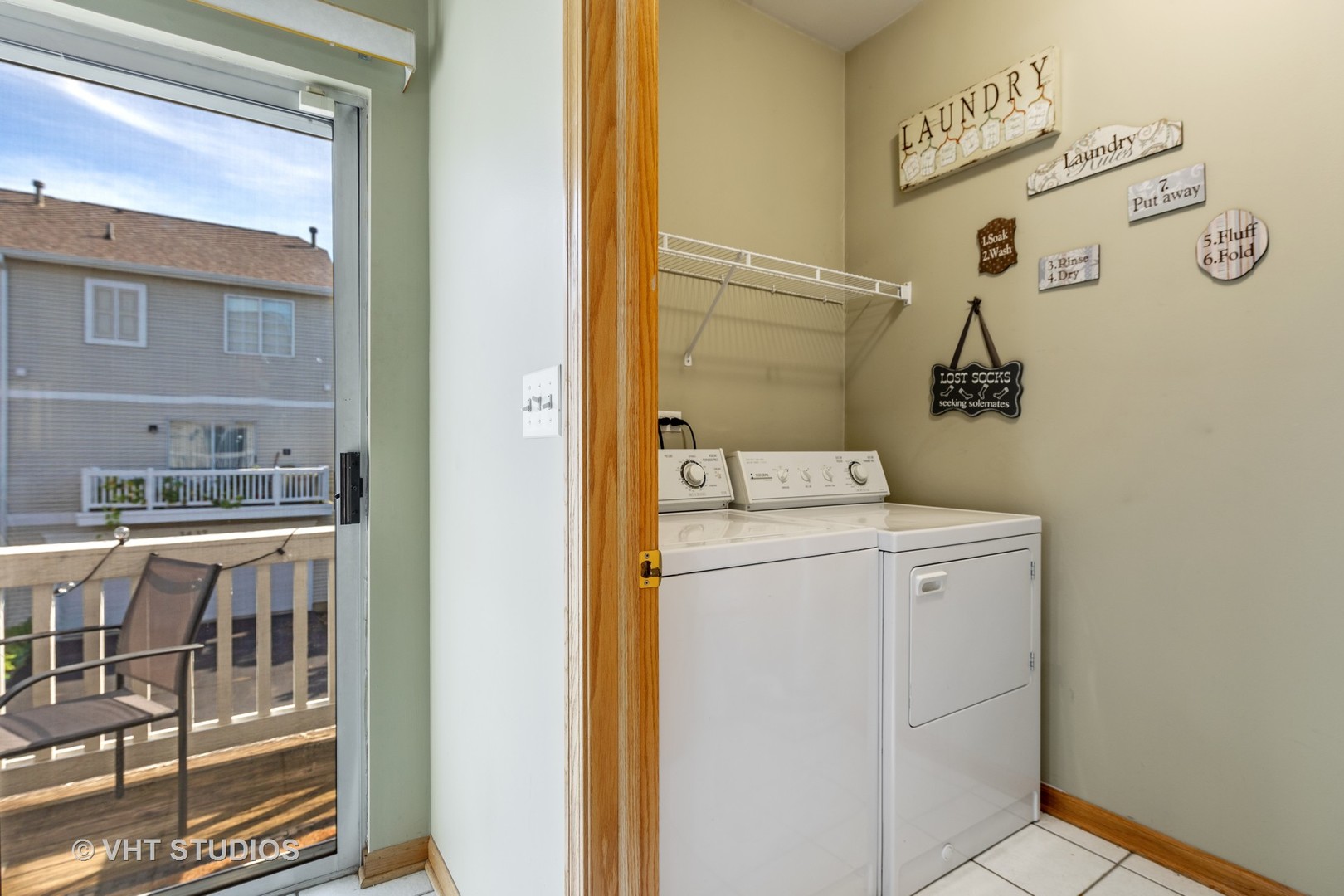 3423 Ravinia Circle Aurora, IL 60504 - Photo 17 of 17 a utility room with dryer and washer