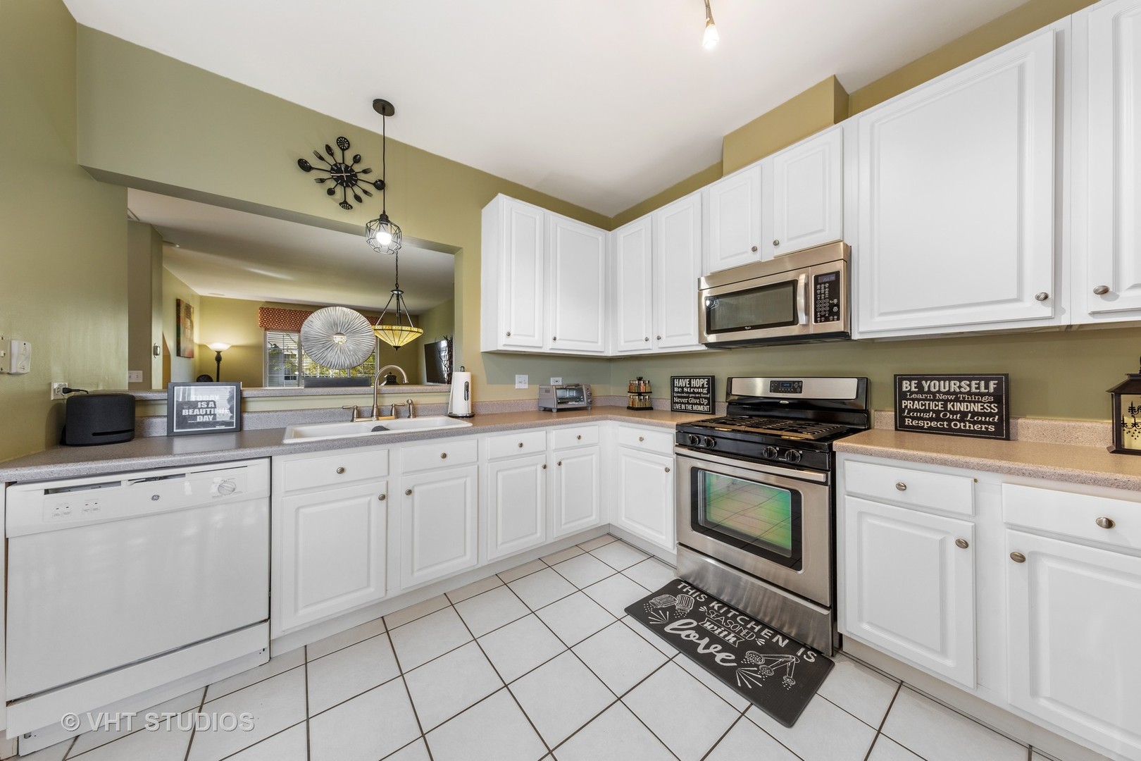 3423 Ravinia Circle Aurora, IL 60504 - Photo 10 of 17 a kitchen with cabinets appliances cabinets and furniture