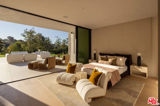a bathroom with a large tub and sink
