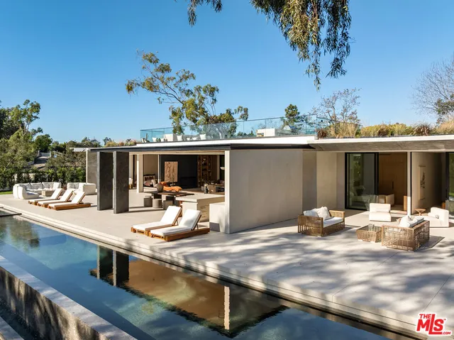 a view of balcony and yard