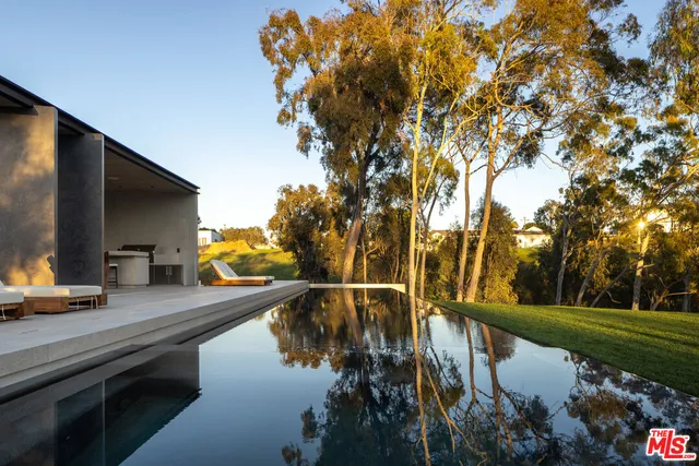 a view of living room kitchen and dining area