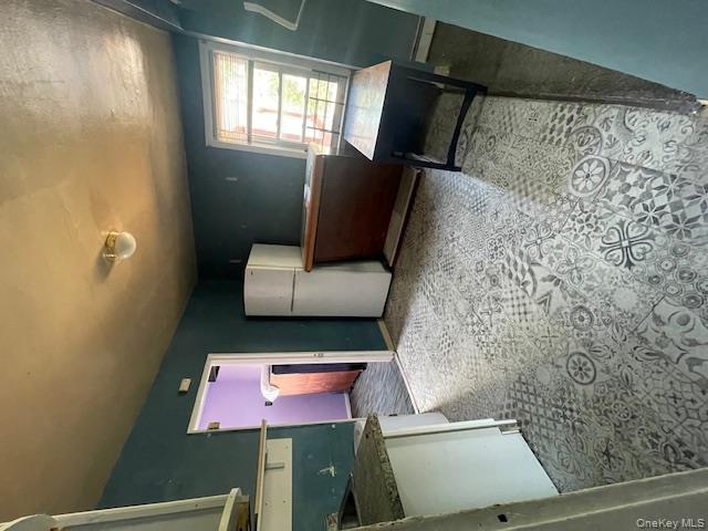 140-36 184th Street Queens, NY 11413 - Photo 12 of 15 a living room with furniture and a window