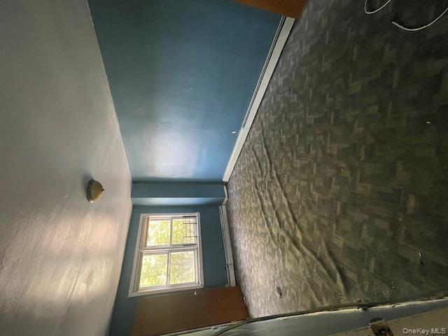 140-36 184th Street Queens, NY 11413 - Photo 2 of 15 an empty room with windows