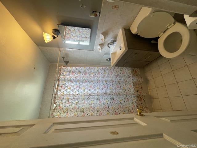 140-36 184th Street Queens, NY 11413 - Photo 9 of 15 a bathroom with a sink toilet and shower