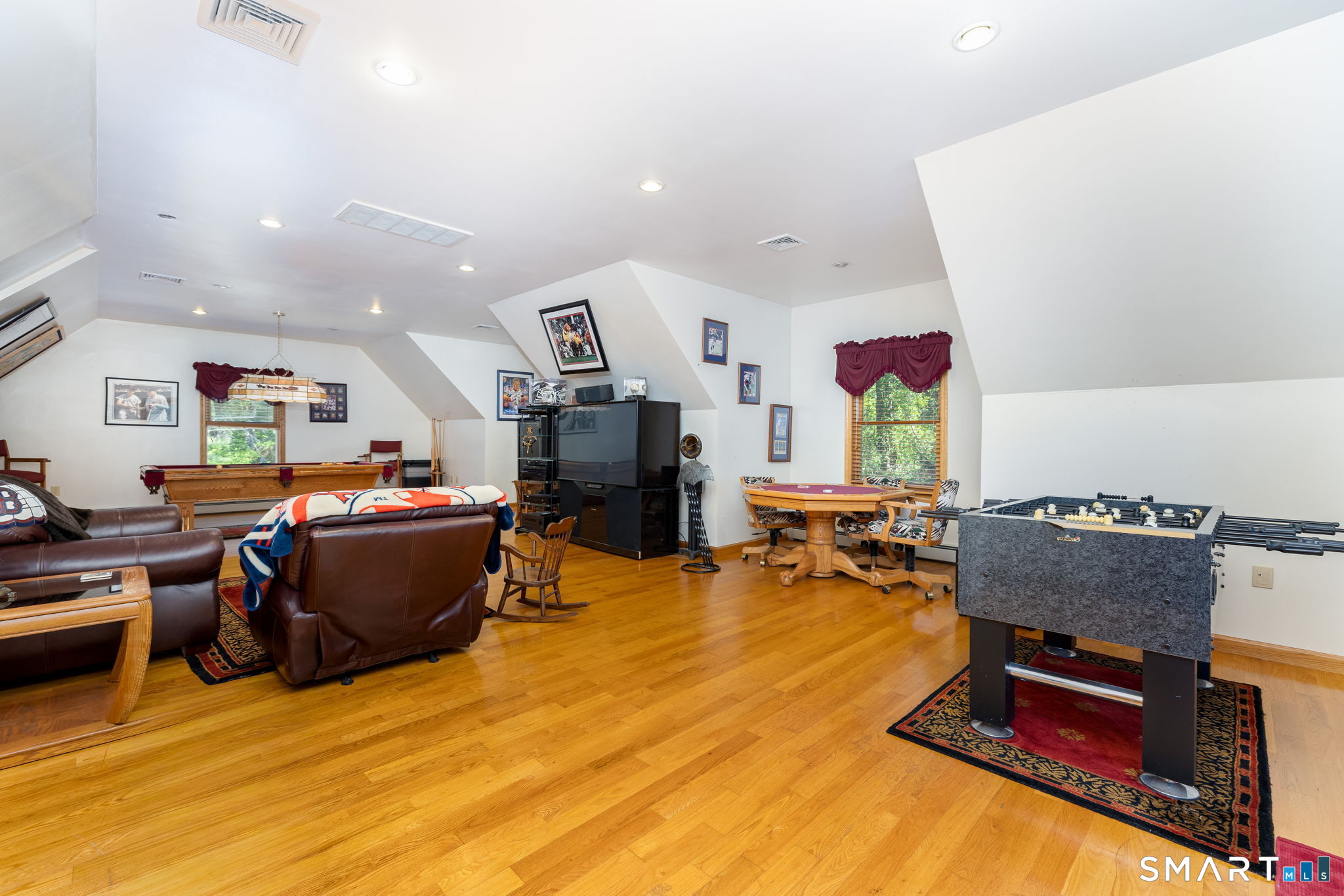 39 Chapman Road Marlborough, CT 06447 - Photo 24 of 40 a living room with furniture and a flat screen tv