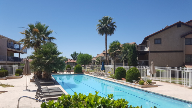 860 South Village Road, Unit H1 St. George, UT 84770 - Photo 11 of 20 Community pool with a patio area