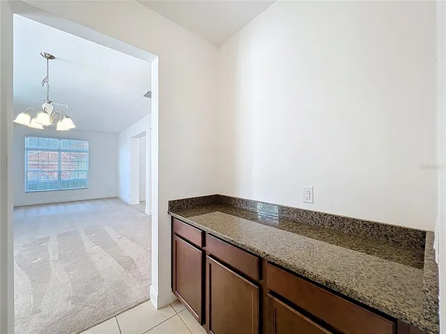 a view of a kitchen cabinets a sink and dishwasher