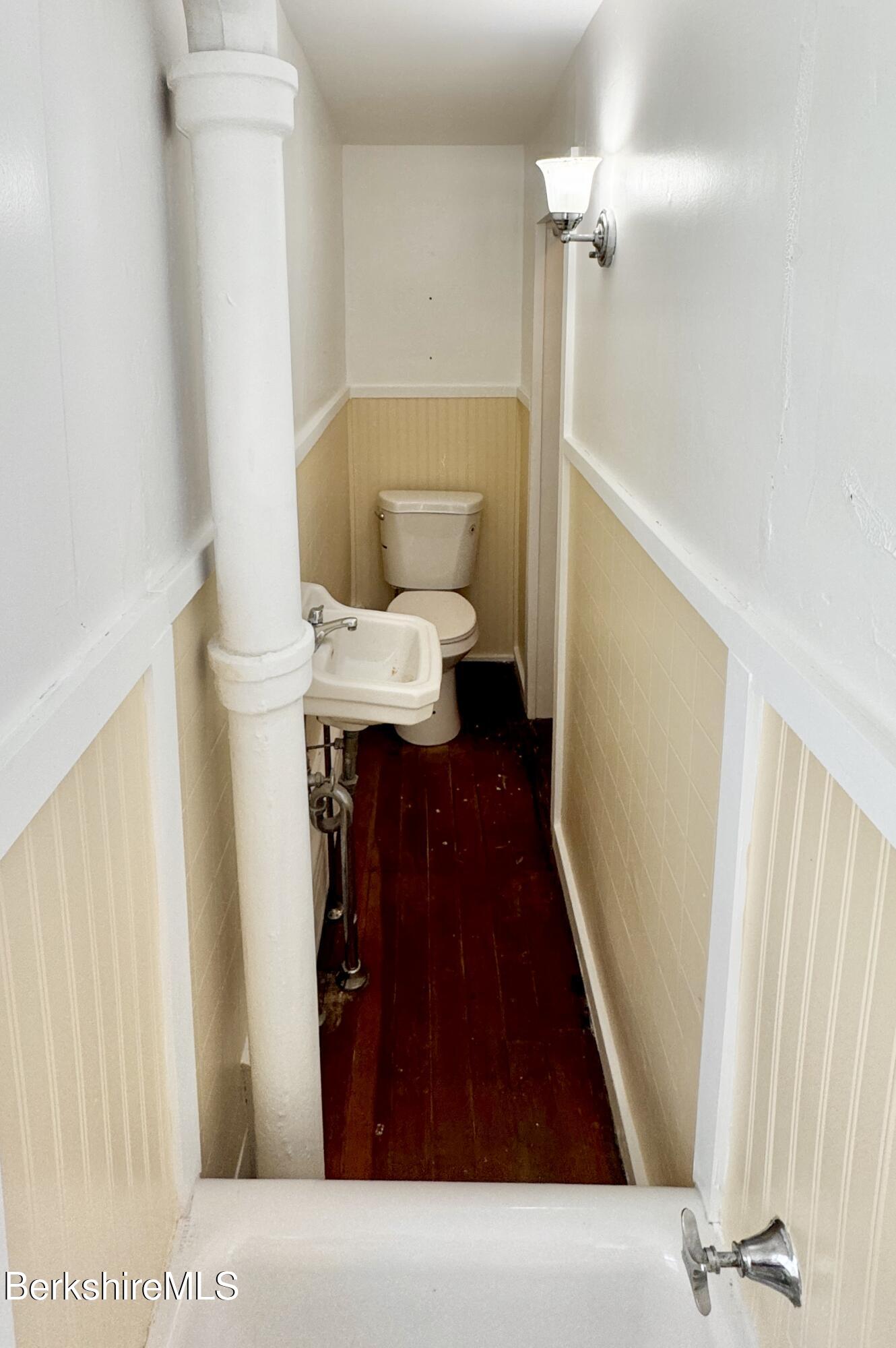 21 Enterprise Street Adams, MA 01220 - Photo 15 of 31 a hallway with wooden floor