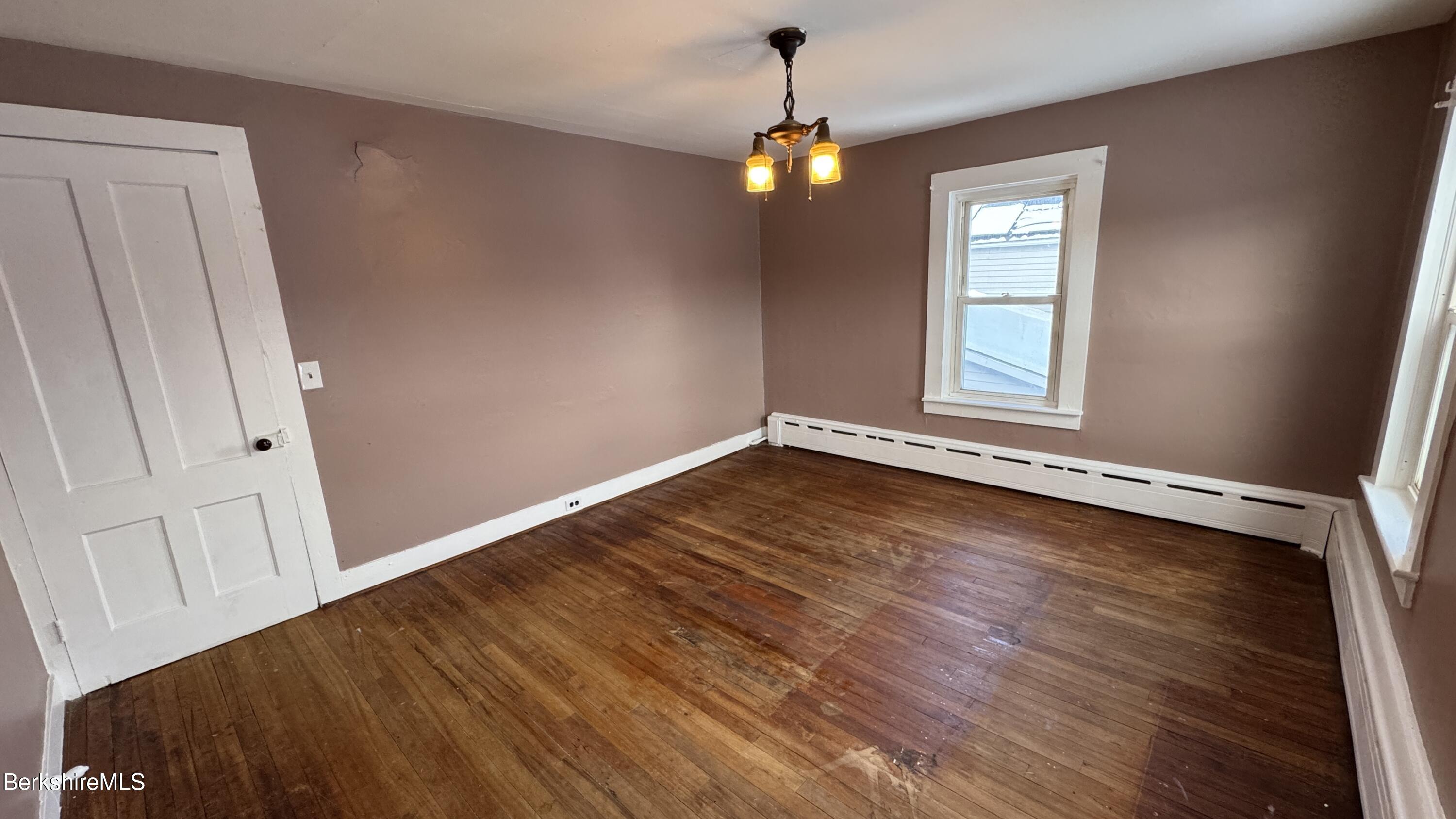 21 Enterprise Street Adams, MA 01220 - Photo 18 of 31 a view of a room with wooden floor and window