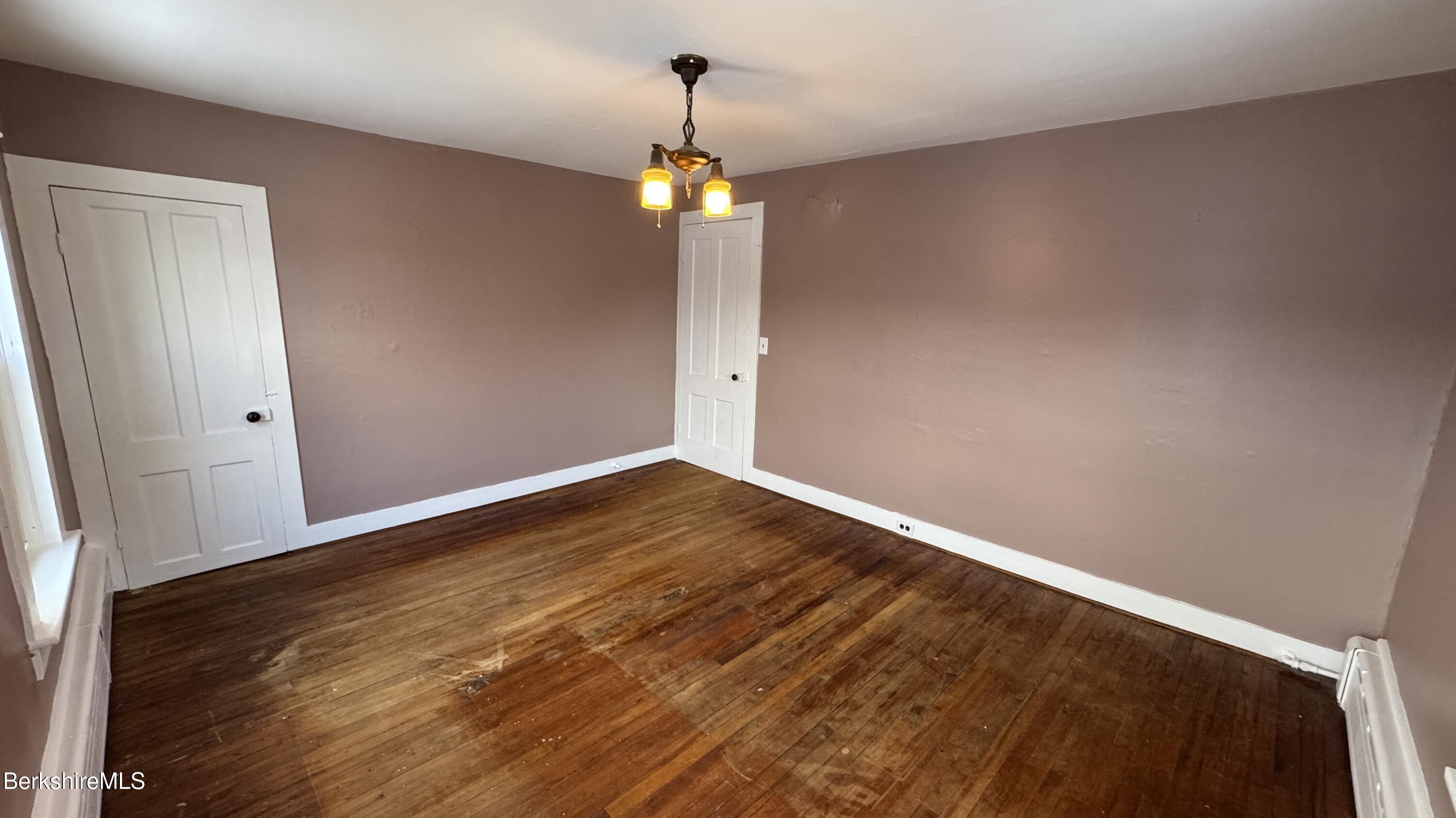 21 Enterprise Street Adams, MA 01220 - Photo 19 of 31 a view of empty room with wooden floor and fan