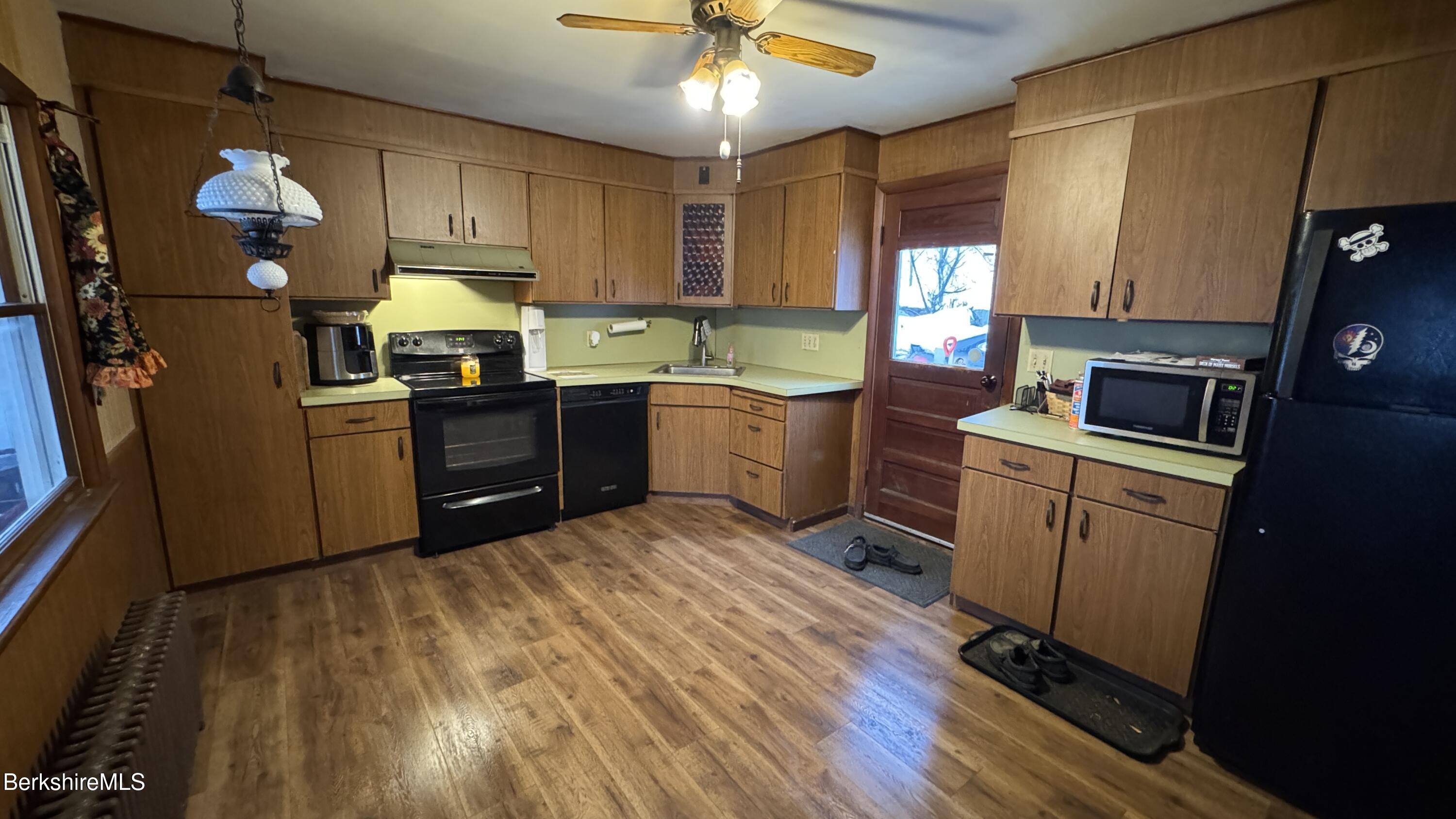 21 Enterprise Street Adams, MA 01220 - Photo 2 of 31 a kitchen with a sink appliances and cabinets