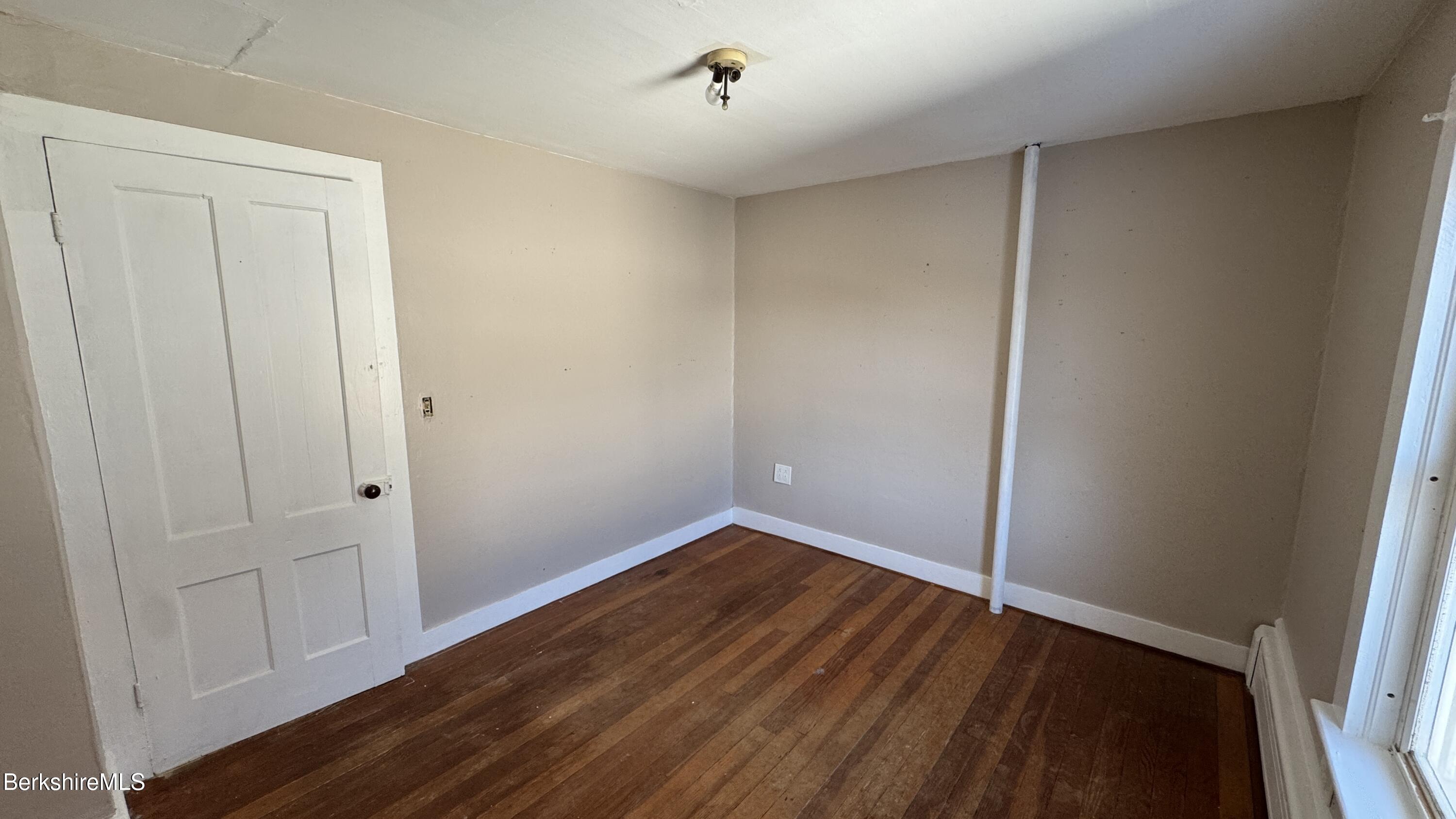 21 Enterprise Street Adams, MA 01220 - Photo 24 of 31 wooden floor in an empty room