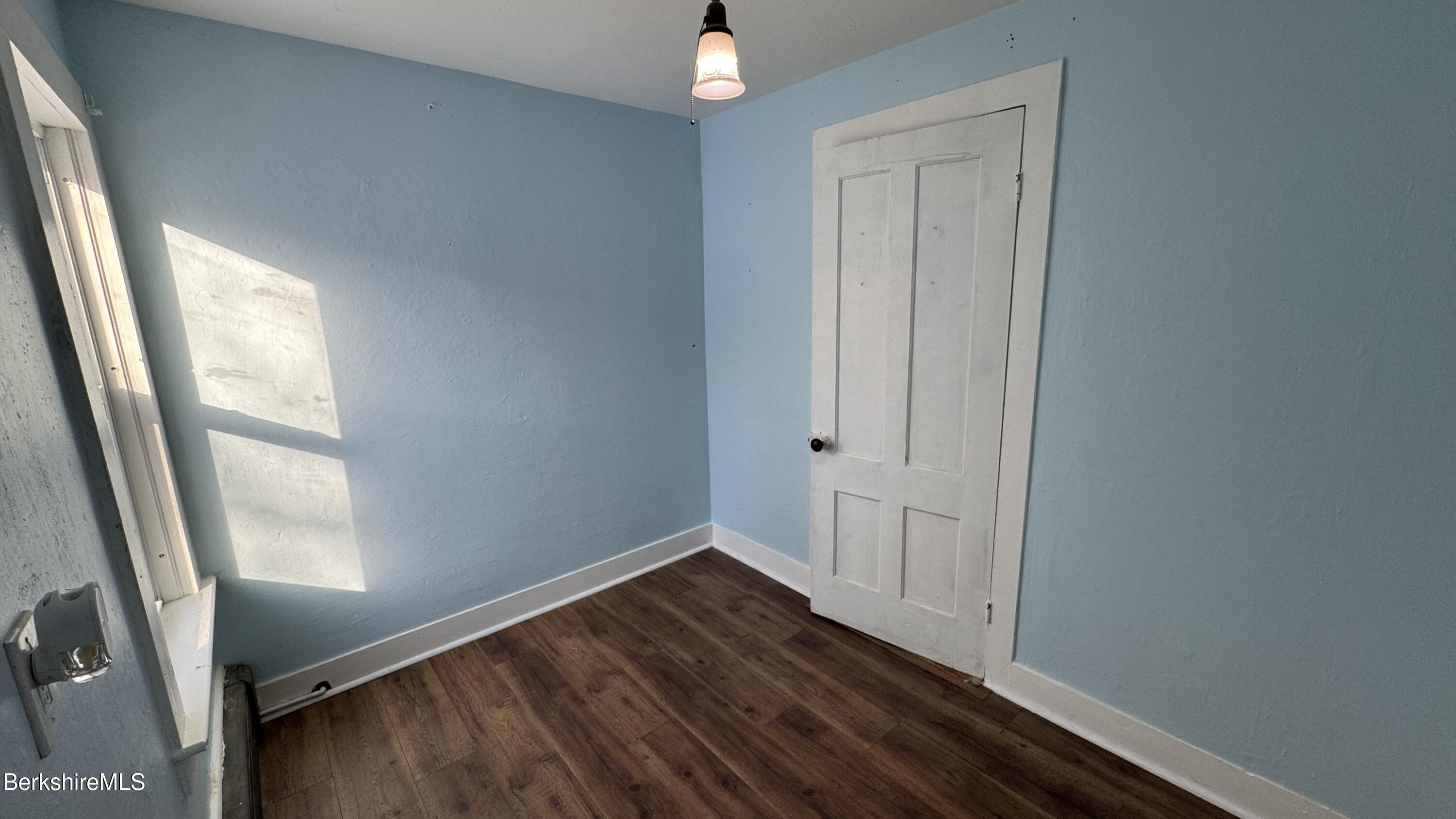 21 Enterprise Street Adams, MA 01220 - Photo 25 of 31 a view of empty room with wooden floor and fan