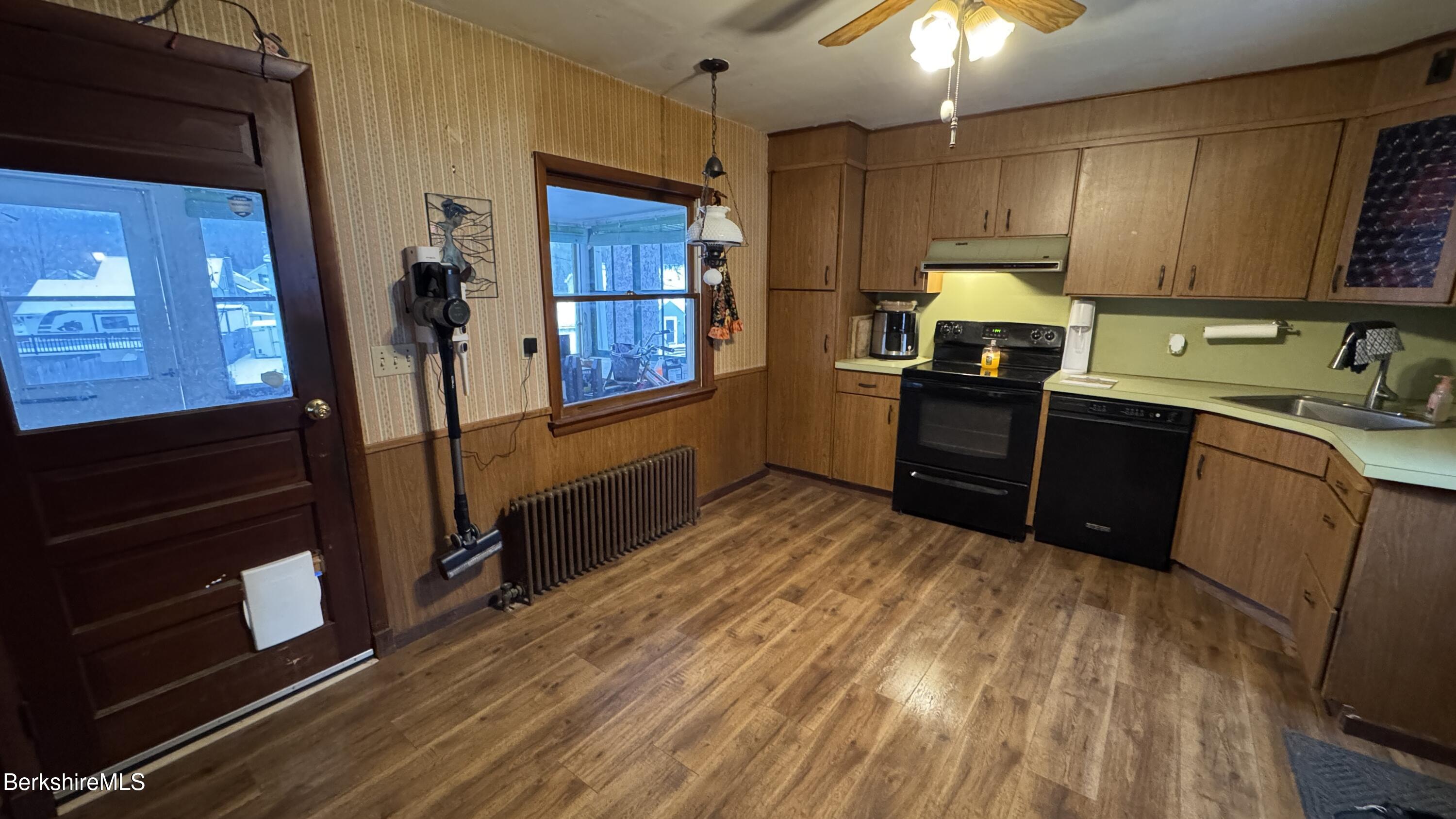 21 Enterprise Street Adams, MA 01220 - Photo 4 of 31 a kitchen with a sink appliances and cabinets
