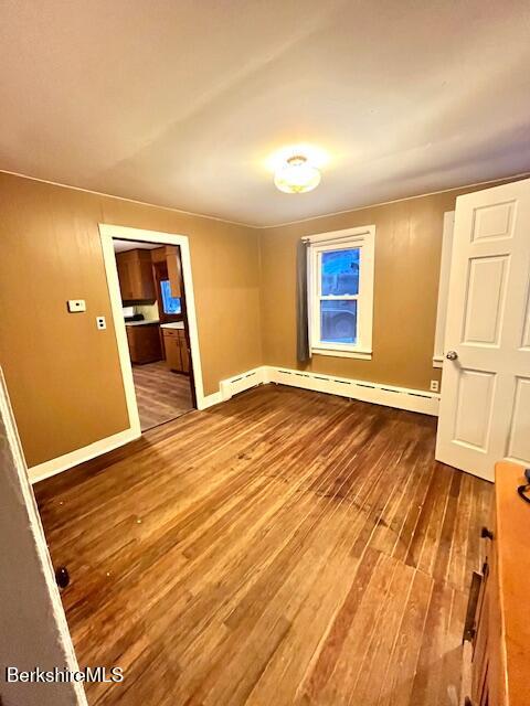 21 Enterprise Street Adams, MA 01220 - Photo 6 of 31 an empty room with wooden floor and windows
