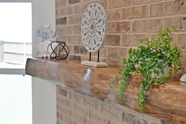 a view of a vase of flowers sitting on a table