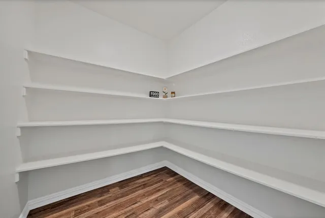 a view of an empty walk in closet