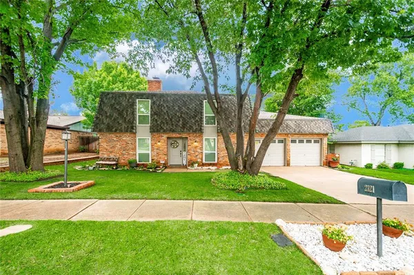 a view of a back yard with green space