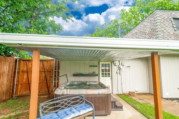 a swimming pool with wooden fence