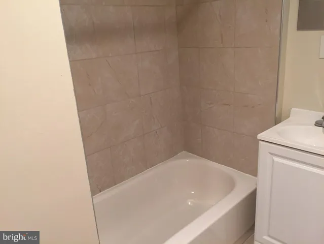 a bathroom with a bathtub