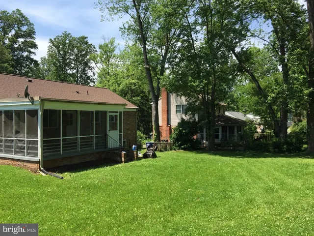 a view of a house with a garden